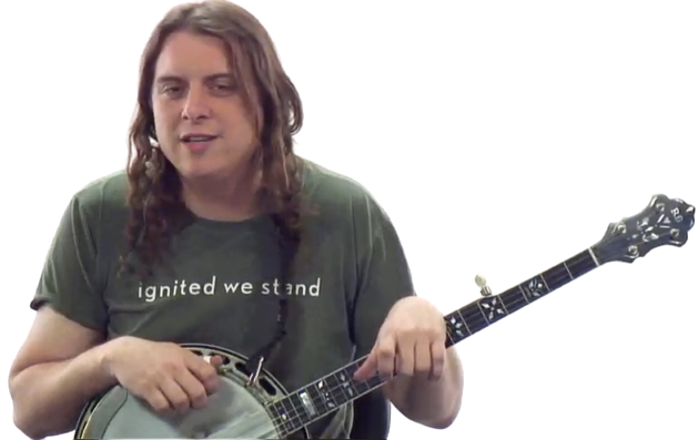 Ben Wright holding the banjo