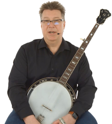 Ned Luberecki holding the banjo